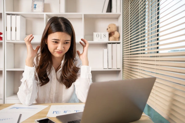 Frustrated businesswoman struggling with financial record-keeping and compliance