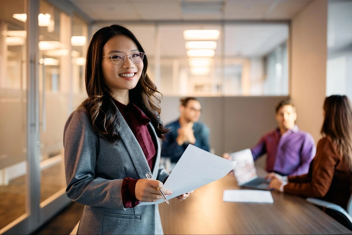 Company directors discussing AGM requirements and financial statements in Singapore