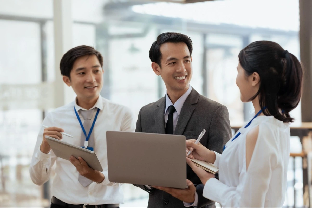 Professional team reviewing company compliance calendar and statutory deadlines in Singapore